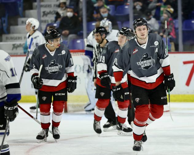 Vancouver Giants left wing Zach Ostapchuk (right) vs. the Victoria Royals