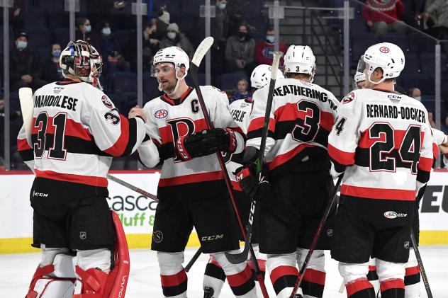 Belleville Senators exchange congratulations