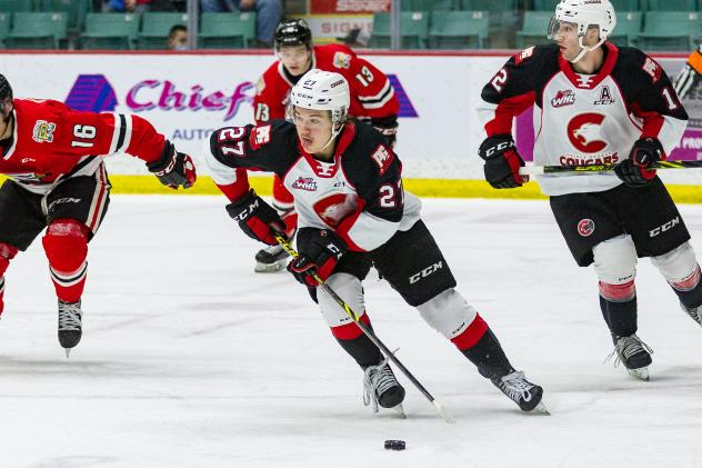 Prince George Cougars centre Riley Heidt leads the charge against the Portland Winterhawks