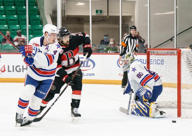 Belleville Senators centre Mark Kastelic puts a shot on the Rochester Americans