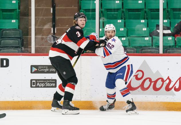 Belleville Senators left wing Roby Jarventie (left) vs. the Rochester Americans
