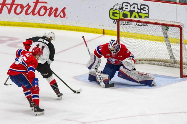 Prince George Cougars right wing Caden Brown looks for a shot against the Spokane Chiefs