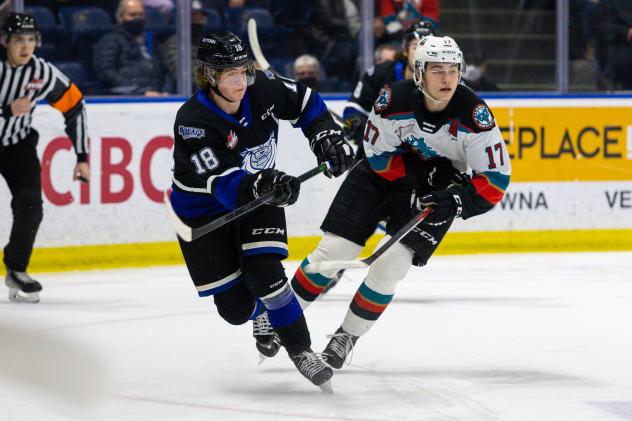 Kelowna Rockets centre Colton Dach (right) vs. the Victoria Royals