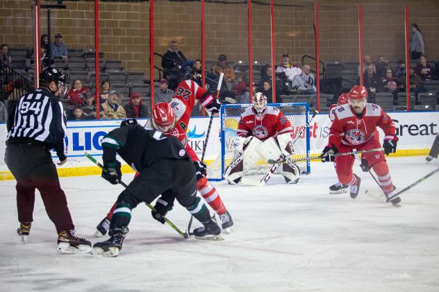 Rapid City Rush goaltender David Tendeck and the Rush defense vs. the Utah Grizzlies
