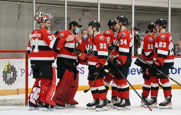 Belleville Senators exchange congratulations