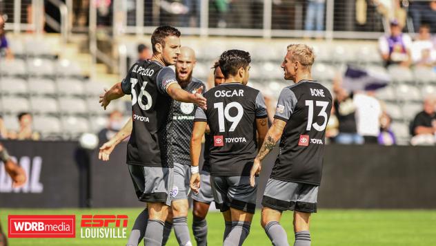 Louisville City FC celebrates a goal