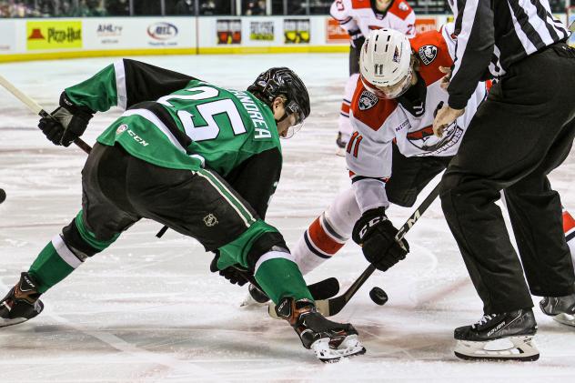 Texas Stars center Ty Dellandrea faces off with the Charlotte Checkers