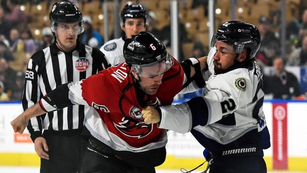Worcester Railers forward Ethan Price (right) dukes it out with the Adirondack Thunder