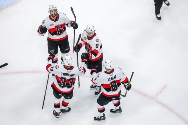 Belleville Senators gather after a goal against the Manitoba Moose