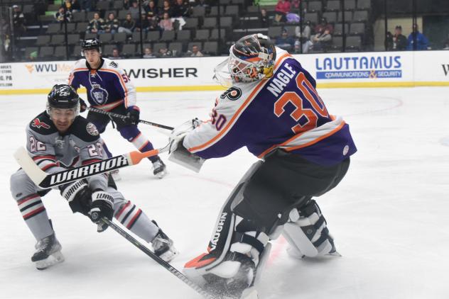 Reading Royals goaltender Pat Nagle fights off the Wheeling Nailers