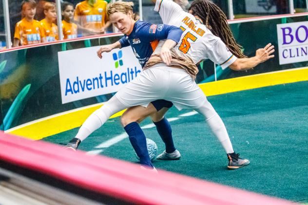 Philip Lund of the Tacoma Stars battles Florida Tropics' Drew Ruggles for the ball in the corner