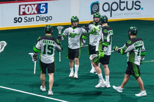 Saskatchewan Rush exchange congratulations after a goal