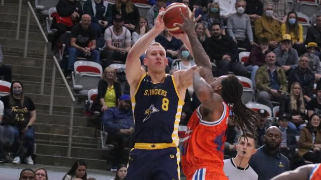 Jordan Baker of the Edmonton Stingers takes a shot against Cangrejeros of Puerto Rico