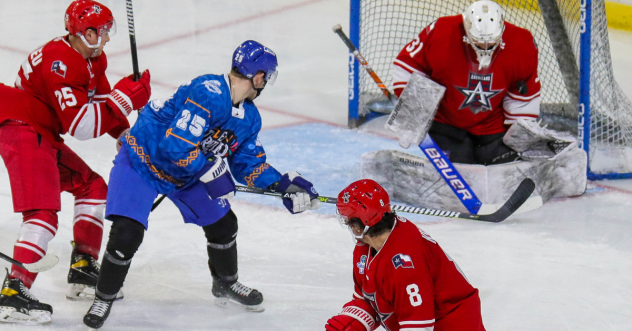 Wichita Thunder forward Logan Fredericks battles the Allen Americans