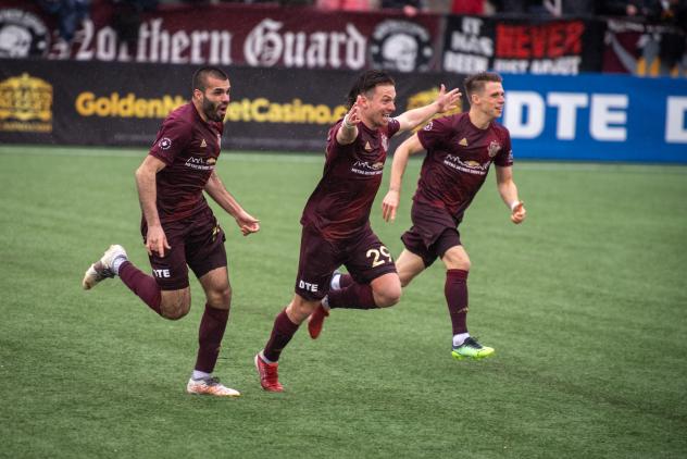 Detroit City FC celebrates Antoine Hoppenot's goal against the Charleston Battery