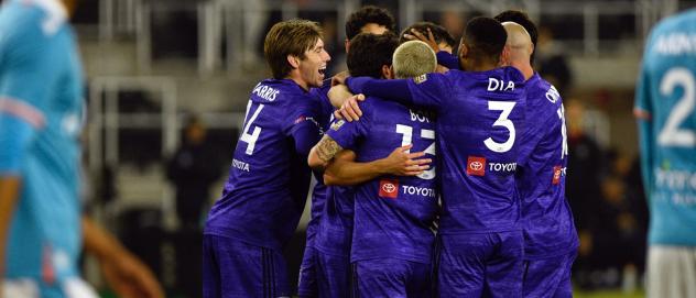 Louisville City FC celebrates a goal against Miami FC
