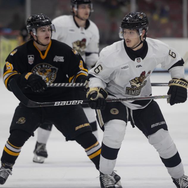 Muskegon Lumberjacks forward David Hymovitch (right) vs. the Green Bay Gamblers