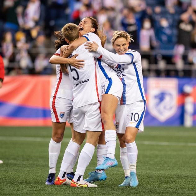 OL Reign celebrates a goal