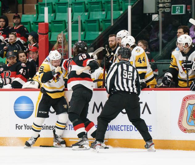 Belleville Senators right wing Scott Sabourin (right) greets the Wilkes-Barre/Scranton Penguins