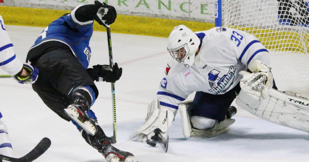 Wichita Thunder goaltender Jake Theut makes a stop