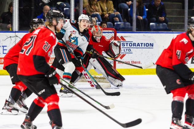 Prince George Cougars defend against the Kelowna Rockets