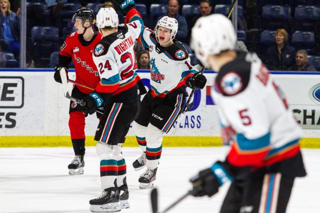Kelowna Rockets react after a goal against the Prince George Cougars