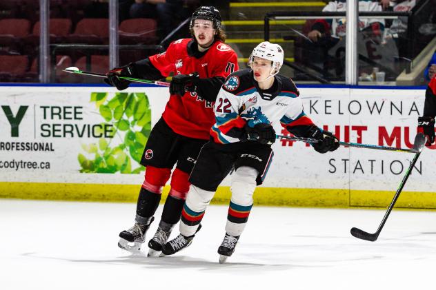 Kelowna Rockets left wing Gabriel Szturc (right) vs. the Prince George Cougars