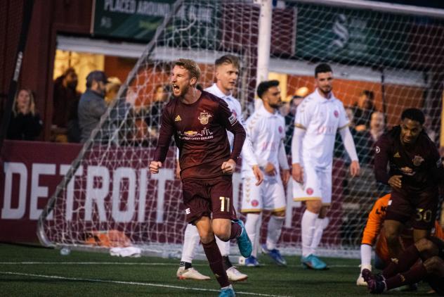 Detroit City FC forward Connor Rutz reacts after his header scored against the Michigan Stars