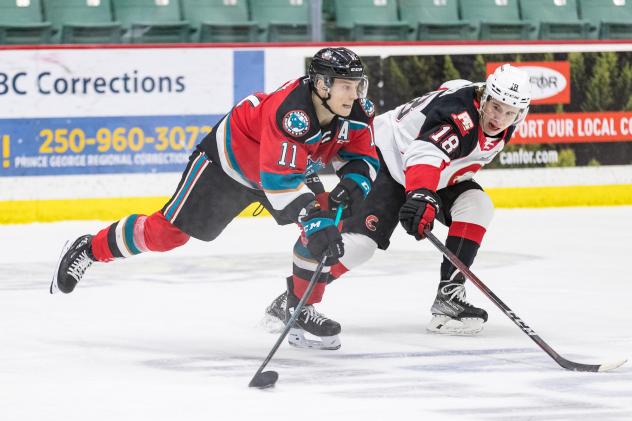 Kelowna Rockets right wing Pavel Novak vs. the Prince George Cougars