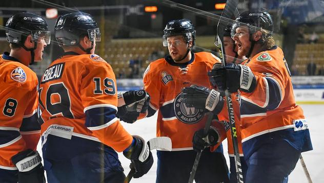 Worcester Railers exchange congratulations against the Maine Mariners