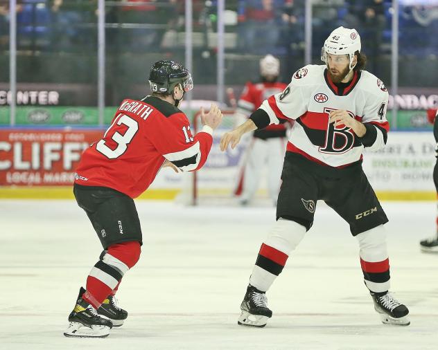 Belleville Senators right wing Scott Sabourin (right) ready to mix it up vs. the Utica Comets