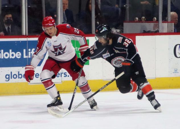 Allen Americans defenseman Philip Beaulieu (left) vs. the Kansas City Mavericks