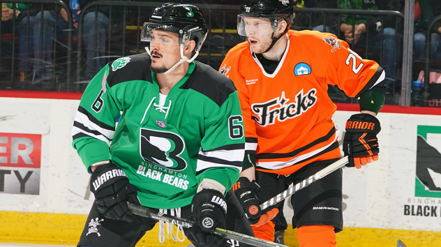 Binghamton Black Bears forward Gavin Abbott (left) vs. the Danbury Hat Tricks