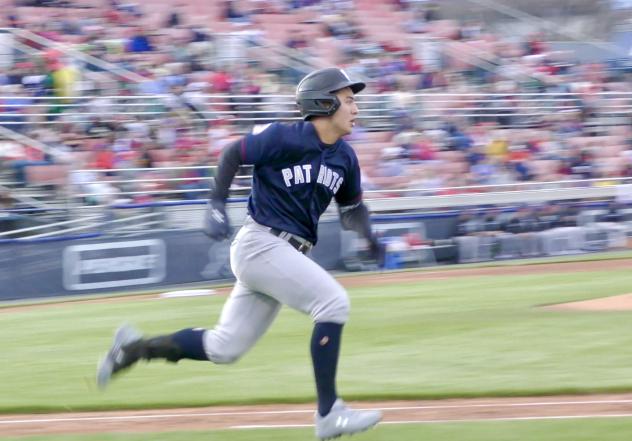 Anthony Volpe of the Somerset Patriots races to first