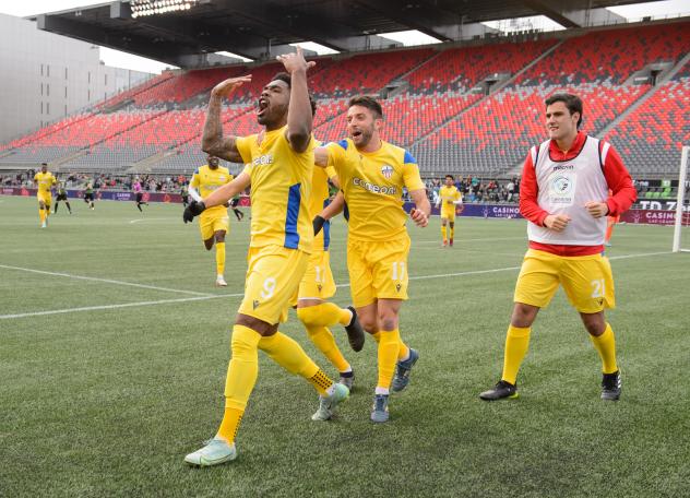Atlético Ottawa celebrates after Brian Wright's goal against Cavalry FC