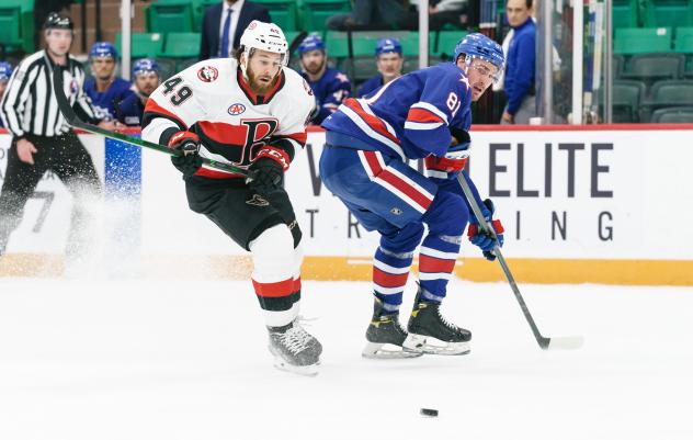 Belleville Senators right wing Scott Sabourin (left) vs. the Rochester Americans