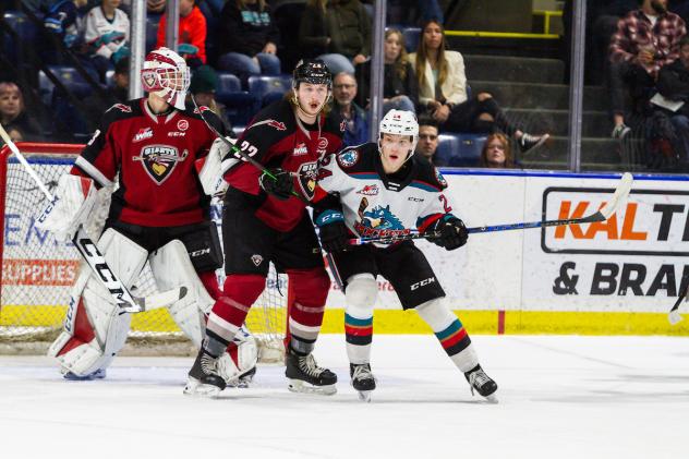 Vancouver Giants defend against the Kelowna Rockets
