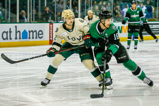 Texas Stars left wing Curtis McKenzie (right) vs. the Iowa Wild