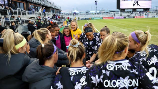 Racing Louisville FC huddle