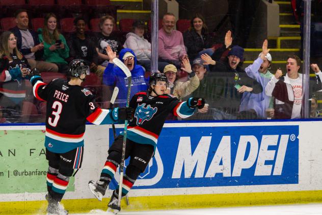 Kelowna Rockets react after a goal against the Prince George Cougars