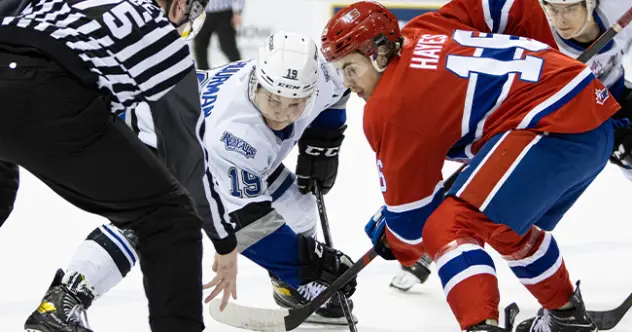 Victoria Royals centre Brayden Schuurman faces off with the Spokane Chiefs