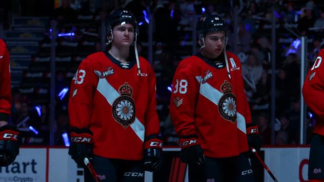Regina Pats forwards Tanner Howe (left) and Connor Bedard