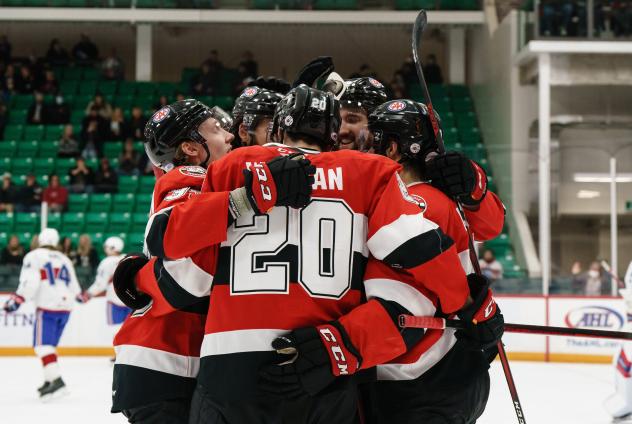 Belleville Senators gather after a goal against the Laval Rocket