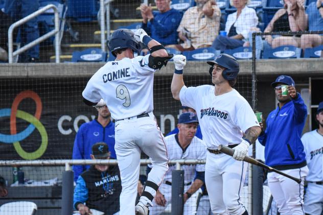 Griffin Conine of the Pensacola Blue Wahoos scores after his home run