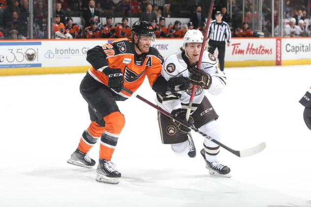 Lehigh Valley Phantoms left wing Max Willman (left) vs. the Hershey Bears