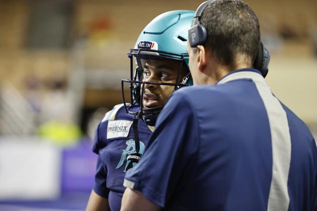 Massachusetts Pirates talk it over with the coach