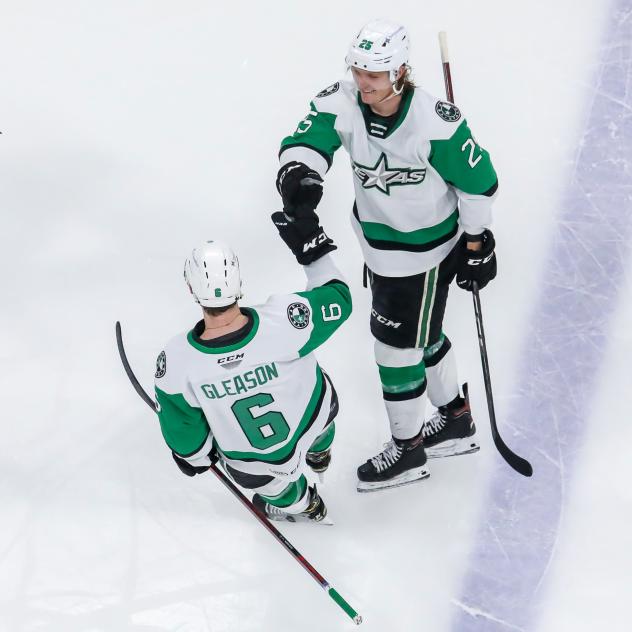 Texas Stars defenseman Ben Gleason and center Ty Dellandrea exchange fist bumps