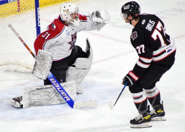 Allen Americans goaltender Luke Peressini makes a save against the Rapid City Rush