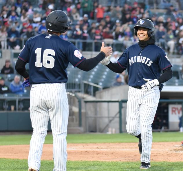 Blake Perkins and the Somerset Patriots celebrate his home run