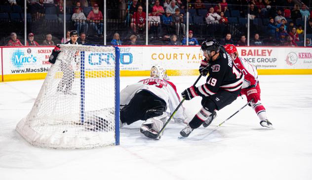 Rapid City Rush forward Calder Brooks scores against the Allen Americans